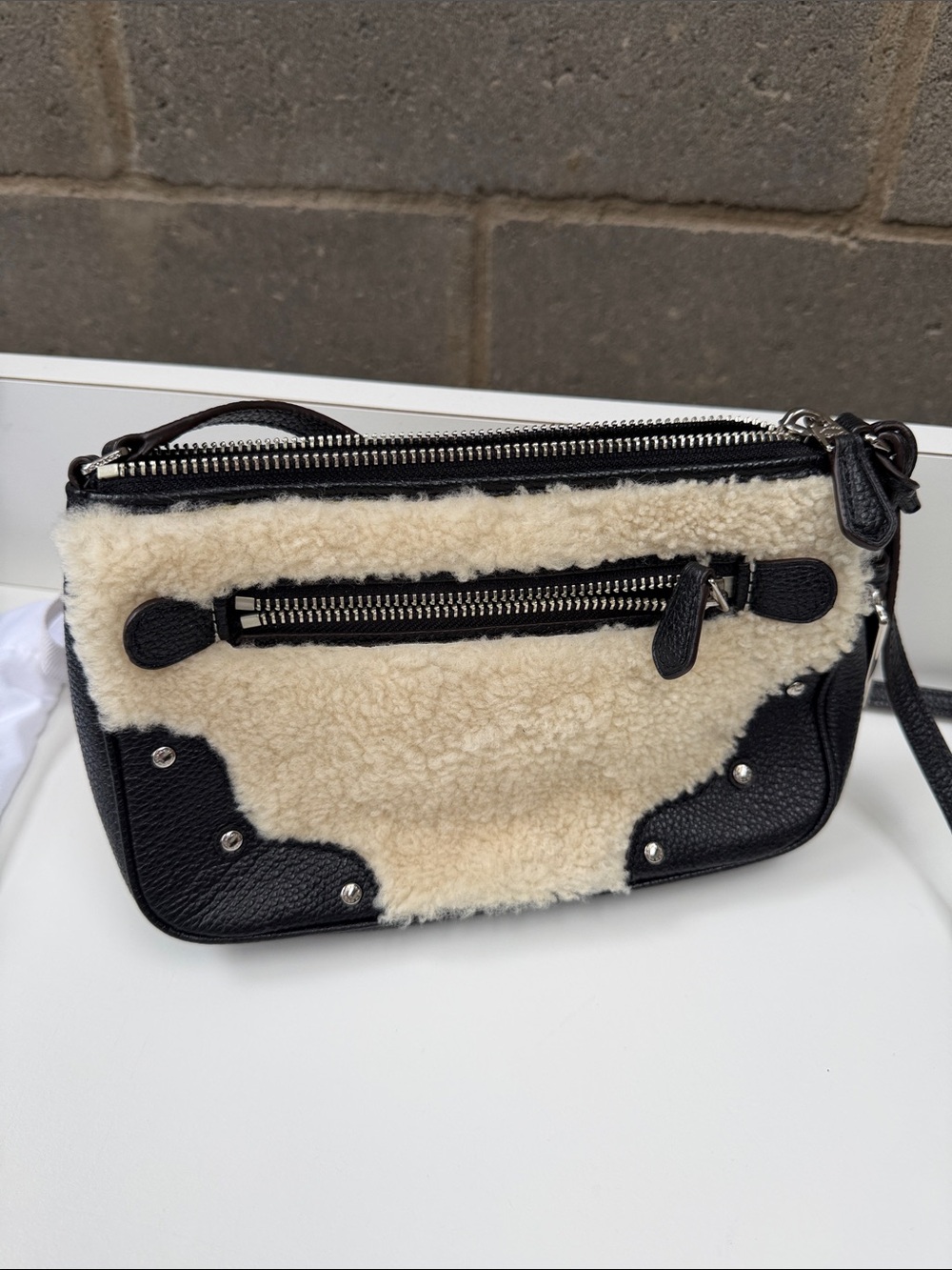 Coach Black Leather and Cream Shearling Crossbody Bag